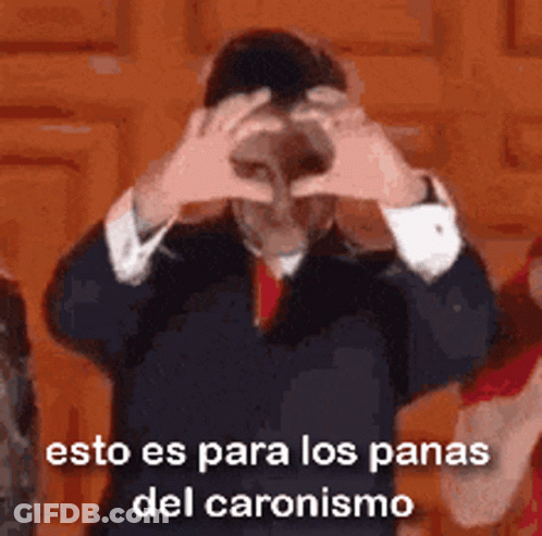 Man In Suit Making Heart Shape GIF