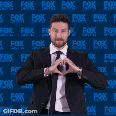 Man In Suit Making Heart Shape With Hands Fox Deportes Background GIF