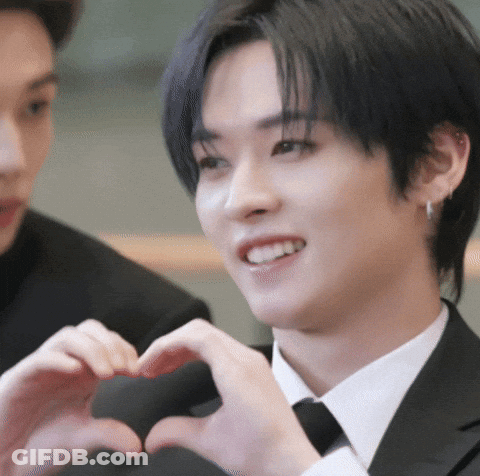 Man In Suit Making Heart With Hands GIF