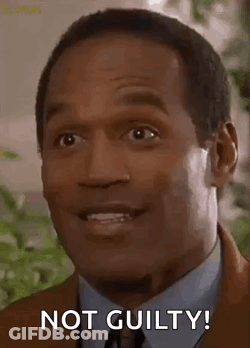 Man In Suit Making Not Guilty Face GIF