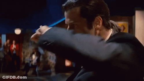 Man In Suit Making Peace Sign GIF