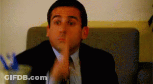Man In Suit Making Shhh Gesture GIF