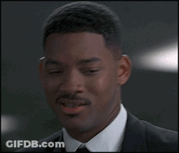 Man In Suit Making Silly Face GIF