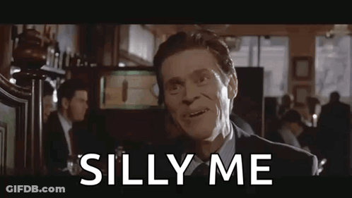Man In Suit Making Silly Face GIF