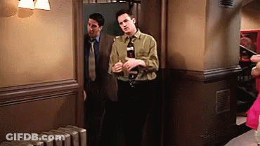 Man In Suit Next To Another Man GIF