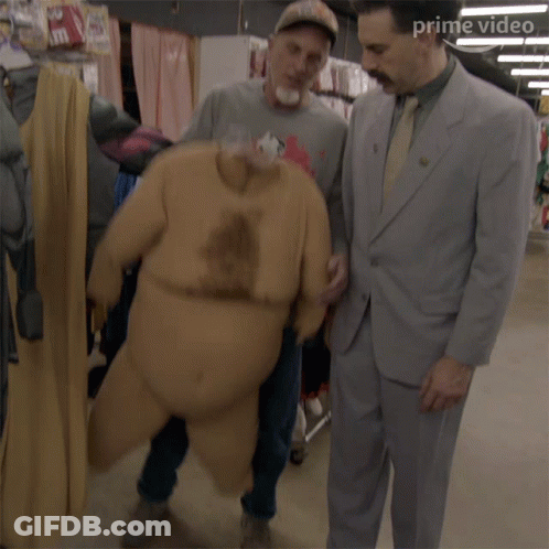 Man In Suit Next To Big Belly Suit GIF