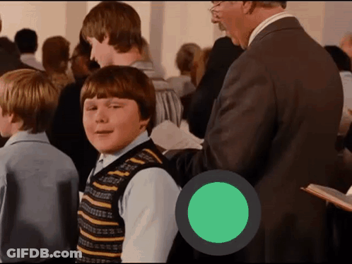 Man In Suit Next To Boy In Vest GIF