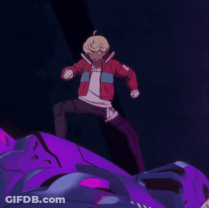 Man In Suit Next To Girl In Red Jacket With Fist GIF