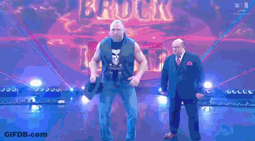 Man In Suit Next To Man In Black Shirt Saying Live GIF