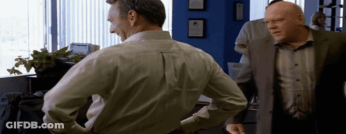 Man In Suit Next To Man In Shirt GIF