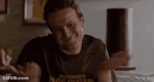 Man In Suit Next To Man In White Shirt GIF