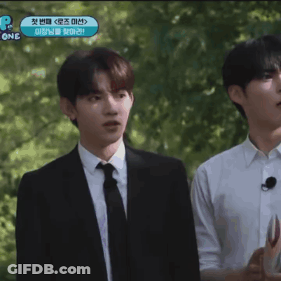 Man In Suit Next To Man In White Shirt GIF