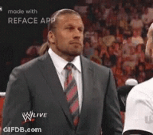 Man In Suit Next To Man In White Shirt GIF