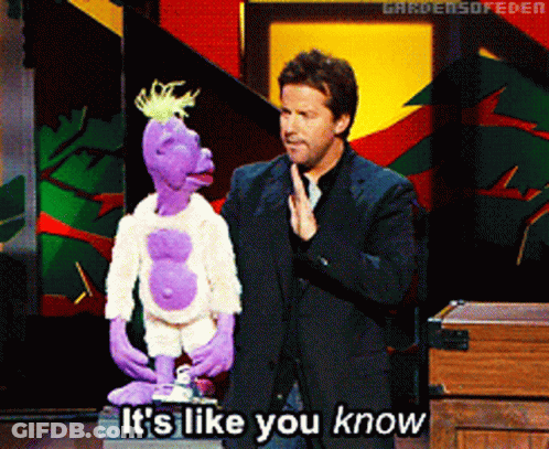 Man In Suit Next To Purple Puppet Saying It's Like You Know GIF