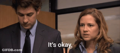 Man In Suit Next To Woman Saying It's Okay GIF