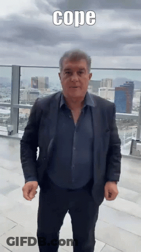 Man In Suit On Balcony Saying Cope GIF