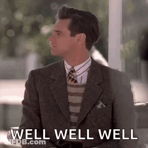 Man In Suit On Bench Saying Well Well Well GIF