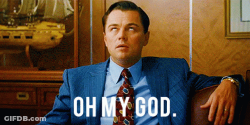 Man In Suit On Couch Saying Oh My God GIF