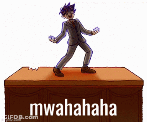 Man In Suit On Desk Saying Mwahaha GIF