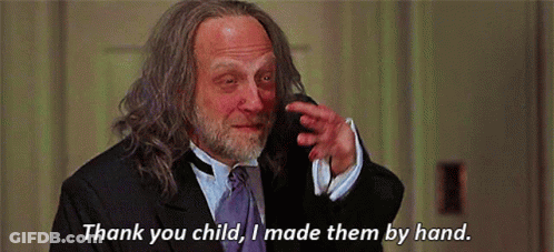 Man In Suit On Phone Saying Thank You Child GIF