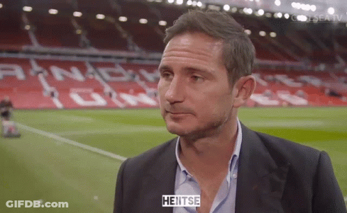 Man In Suit On Soccer Field Saying Heitse GIF