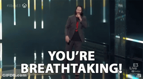 Man In Suit On Stage With You're Breathtaking GIF