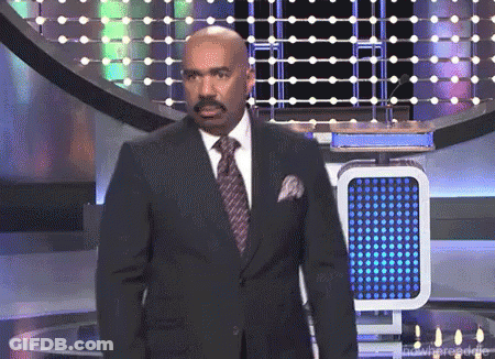 Man In Suit On Stage GIF
