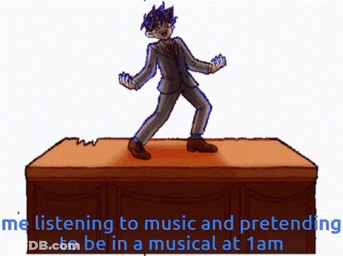 Man In Suit On Table Me Listening To Music GIF