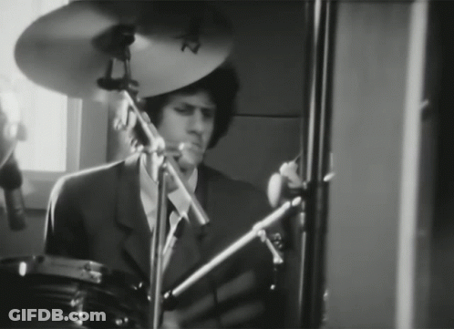 Man In Suit Playing Drums With Sabian Cymbal GIF