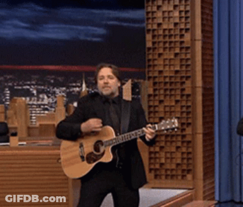 Man In Suit Playing Guitar It's Ur And Into My Car GIF