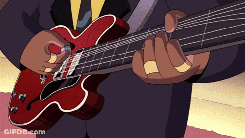 Man In Suit Playing Red Guitar GIF