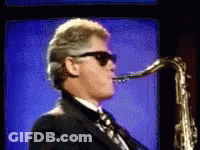 Man In Suit Playing Saxophone GIF