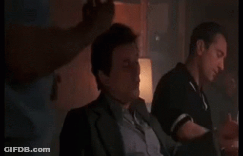 Man In Suit Pointing GIF