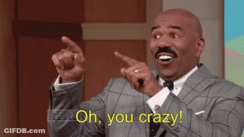 Man In Suit Pointing And Saying Oh You Crazy GIF