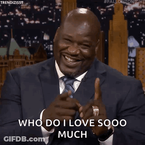 Man In Suit Pointing And Saying Who Do I Love Sooo Much GIF