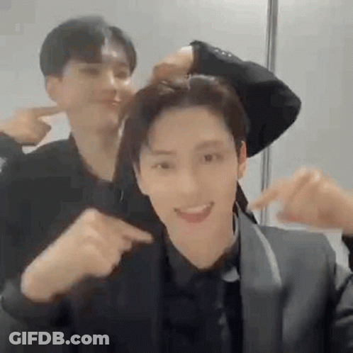 Man In Suit Pointing At Another Man GIF