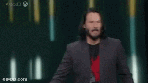 Man In Suit Pointing At Camera Saying Based GIF