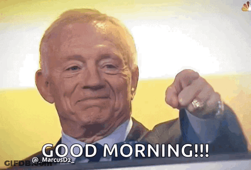 Man In Suit Pointing At Camera Saying Good Morning GIF