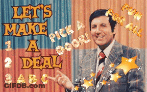 Man In Suit Pointing At Let's Make A Deal Sign GIF