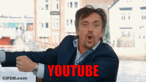 Man In Suit Pointing At YouTube GIF