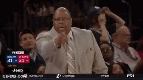 Man In Suit Pointing During Basketball GIF