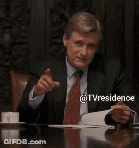Man In Suit Pointing GIF