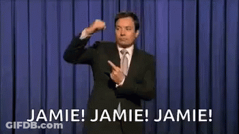 Man In Suit Pointing On Stage GIF