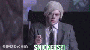 Man In Suit Pointing Saying Snickers GIF
