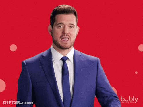 Man In Suit Pointing To Check Mark GIF