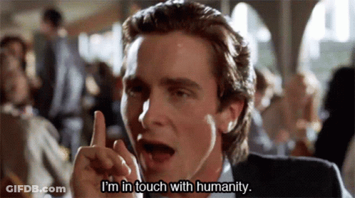 Man In Suit Pointing Up Saying Im In Touch GIF