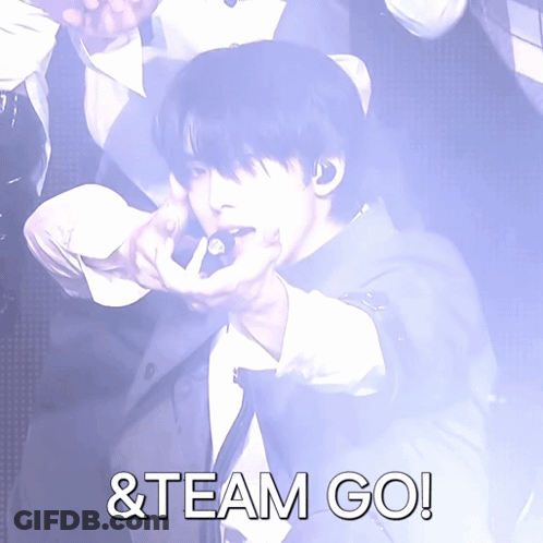 Man In Suit Pointing With Team Go GIF