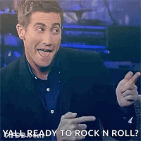 Man In Suit Pointing Yall Ready To Rock N Roll GIF