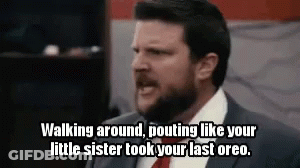 Man In Suit Pouting Like Sister Took Oreos GIF