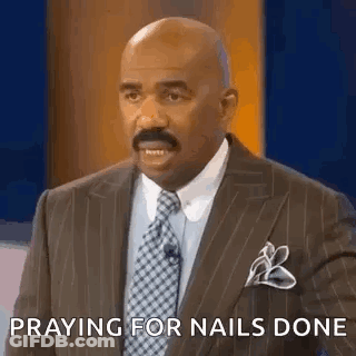 Man In Suit Praying During TV Show GIF